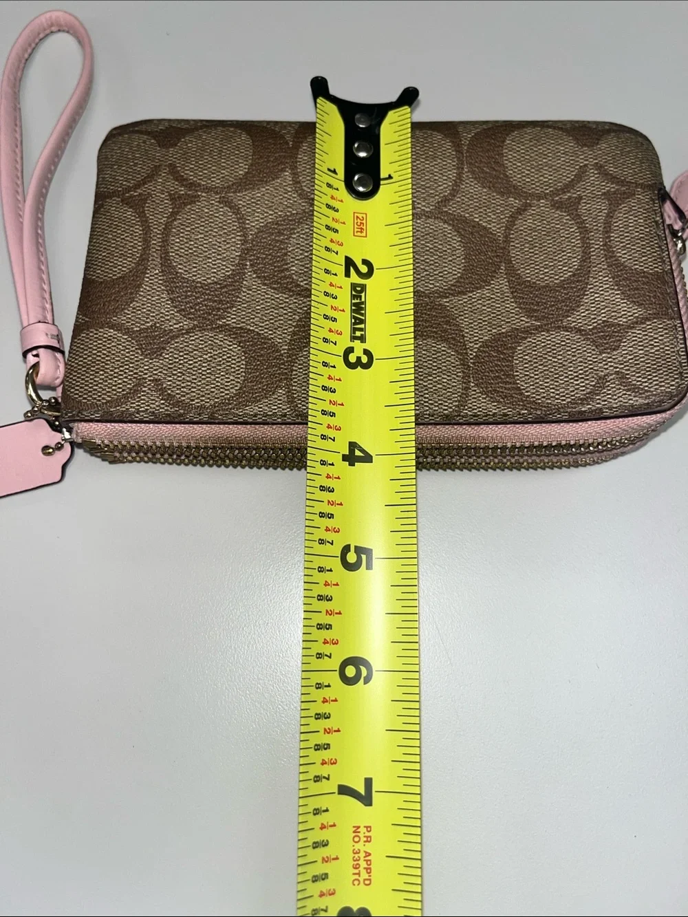 Coach Brown Signature Canvas Wristlet with Pink Trim